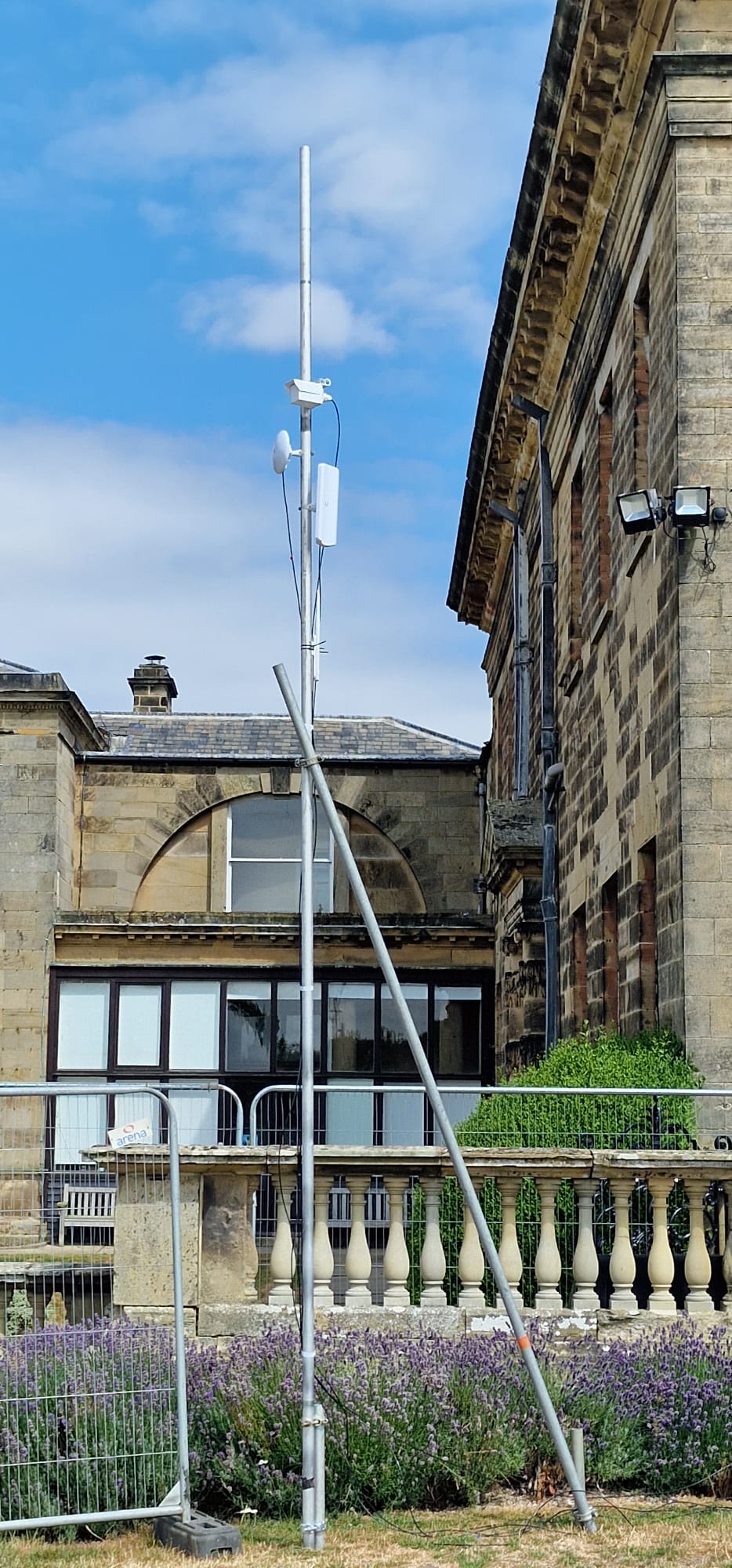 Communications mast installed against the estate building at Deershed Festival site