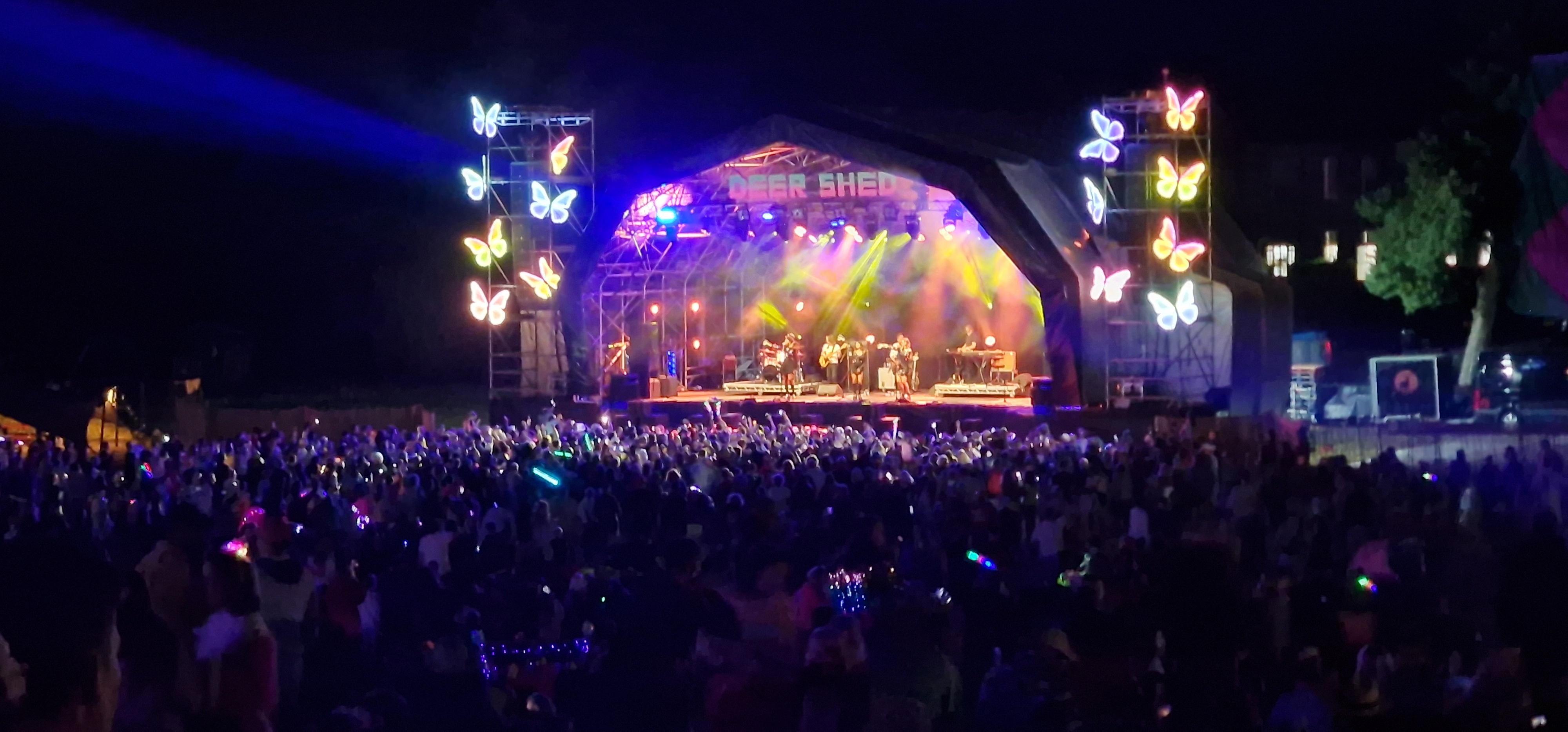 Deershed Festival 2026 main stage with colourful production lighting and packed crowd